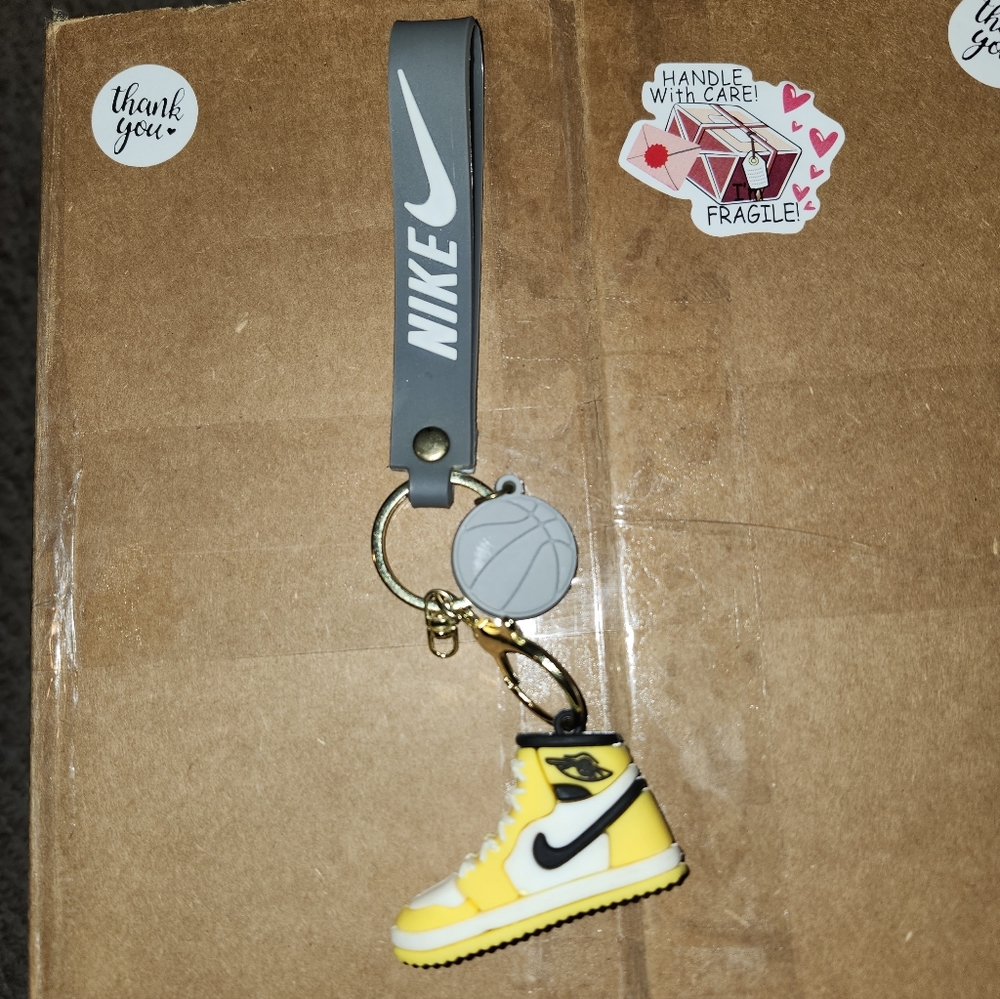 Nike BNWOT Keychain with Sneaker Charm